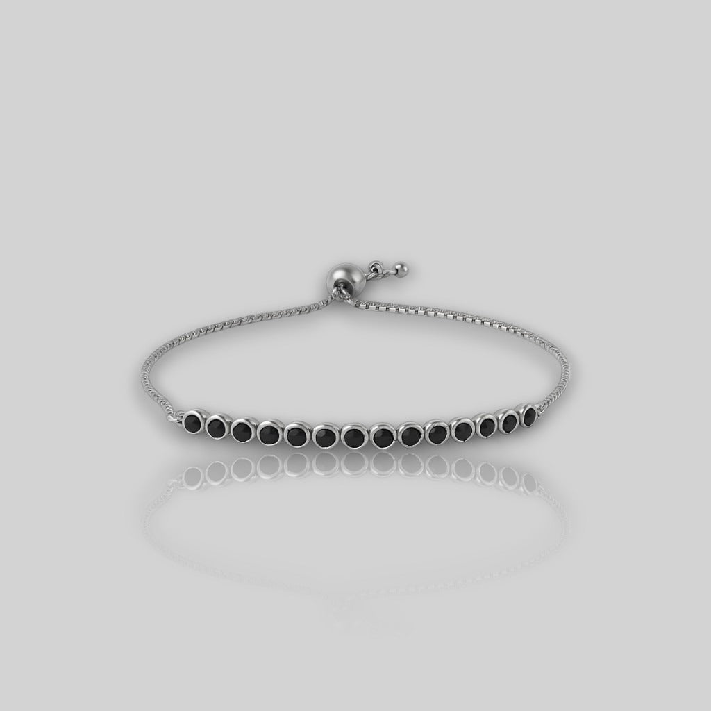 Sleek bracelet with round black moissanite dimond bracelet